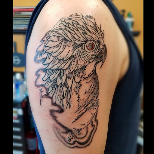 Explore electric guitar tattoo ideas, creative tattoo ideas in Lees Summit, available at Bleeding Heart Tattoo