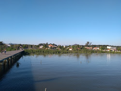 Foto von Praia do Aterro und die siedlung