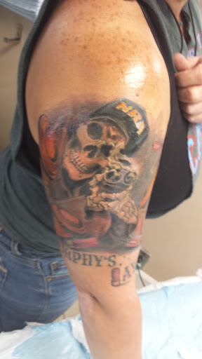 Explore simple cartoon tattoo ideas, creative tattoo ideas in Louisville, available at Tattoo Charlies Preston Hwy.