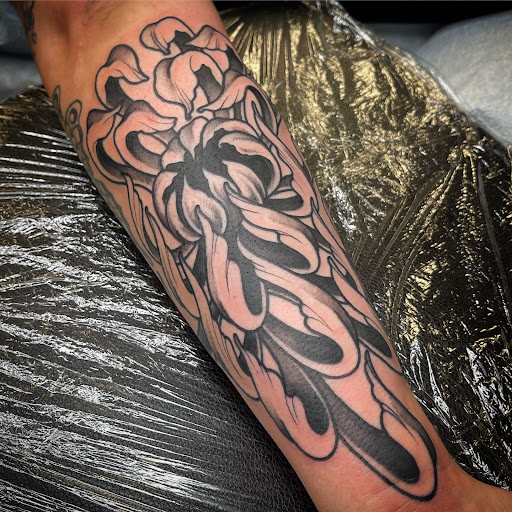 Explore gambler tattoo ideas, creative tattoo ideas in Chatham, available at DMC Tattoo