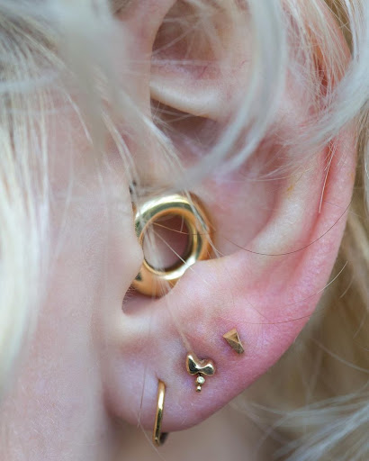 Explore hawaii flower tattoo ideas, creative tattoo ideas in Brooklyn, available at IRIS - a piercing studio