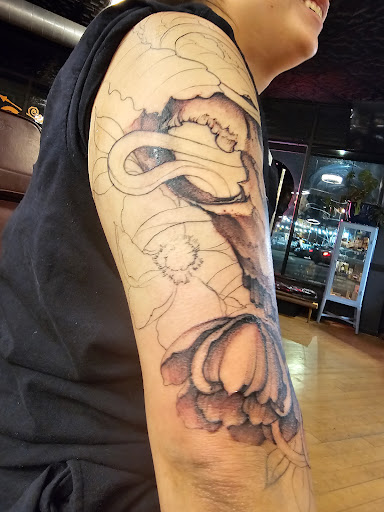 Explore om tattoo ideas, creative tattoo ideas in Chicago, available at Dark Heart Tattoo Chicago