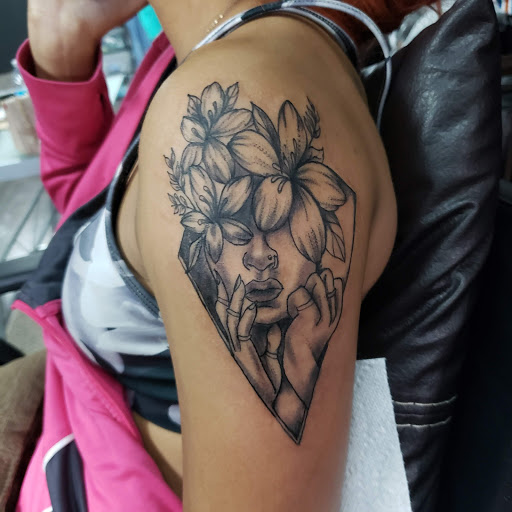 Explore tattoo ideas small flowers, creative tattoo ideas in Dallas, available at Legendary Art Tattoo Studio