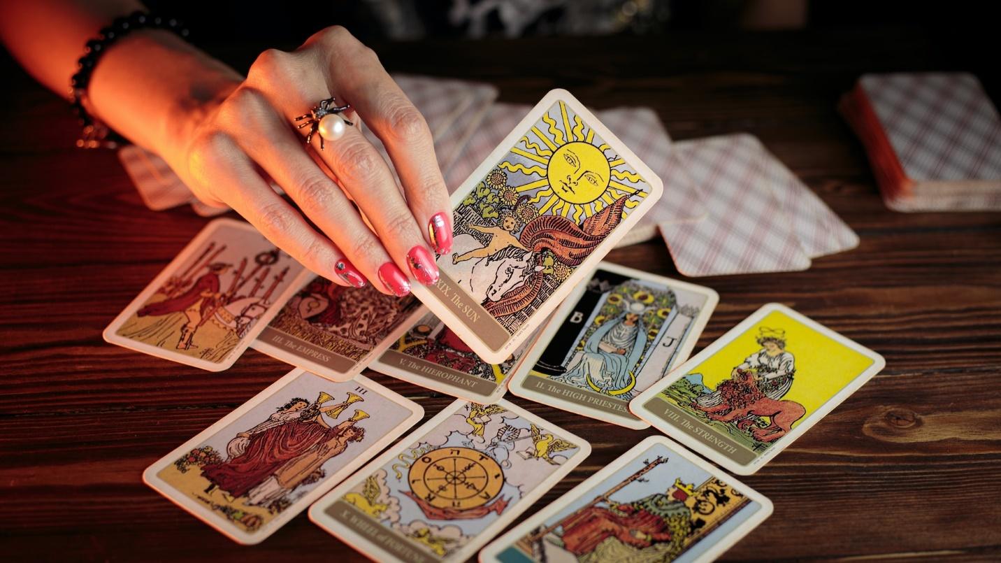 A fortune teller using cards