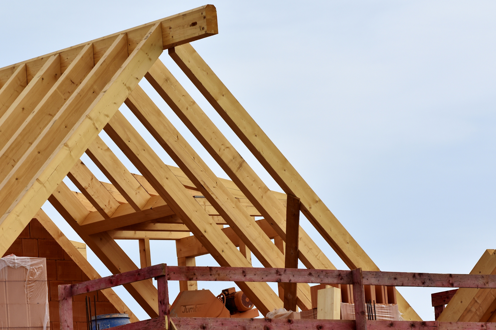 Backyard woodworking shop roof installation