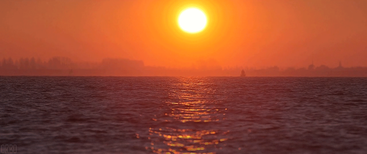 Солнце появилось из за горизонта. Закат над индийским океаном. Живой закат. Закат на море анимация. Закат gif.