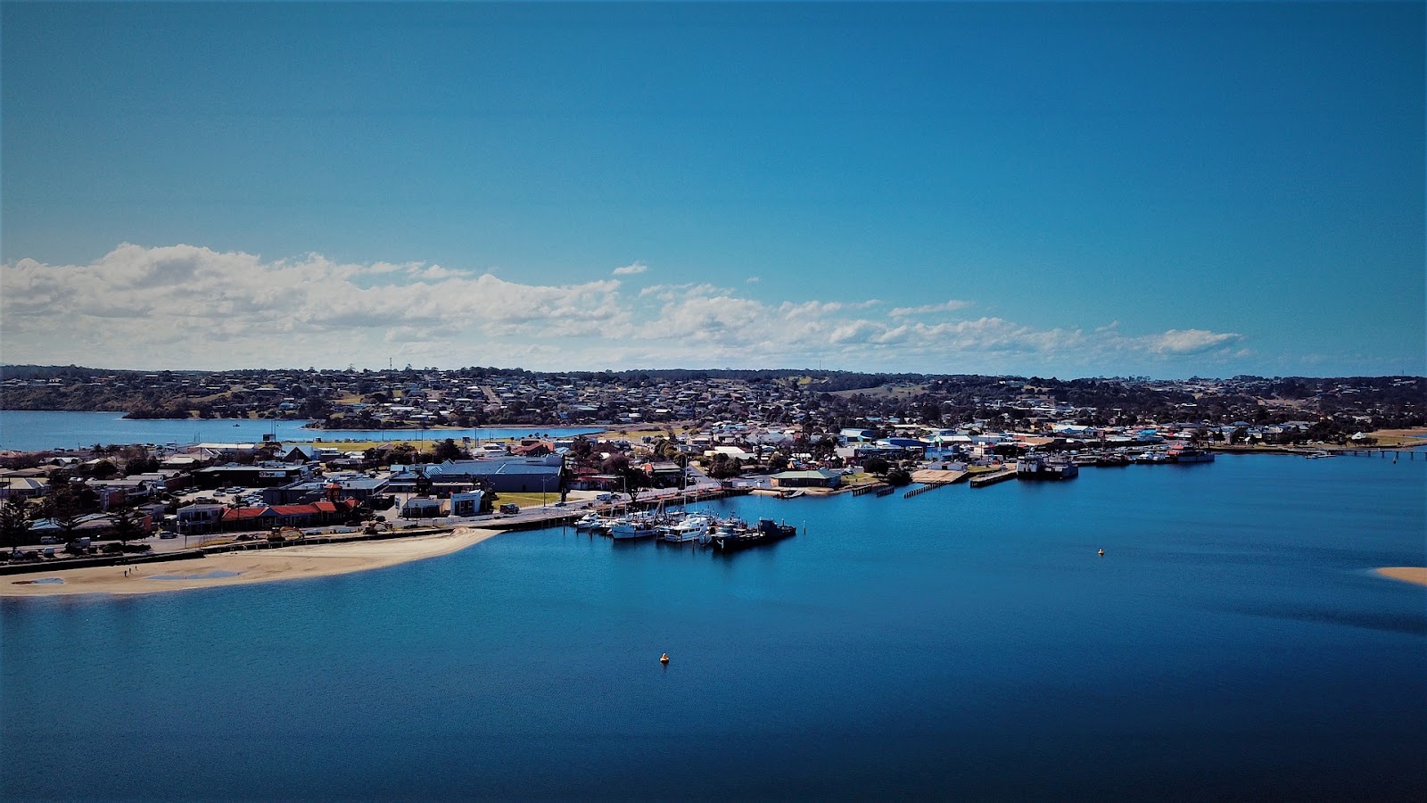 lakes entrance town aerial view on a sunny day from ocean