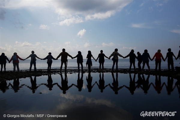 Safe Passage Demonstration on Lesbos People hold hands on a beach in Molyvos, Lesbos, calling for safe passage and no more deaths. The activity was held in solidarity with other protests across Europe on Saturday February 27 as thousands of people in more than 100 cities marched in support of refugee rights.