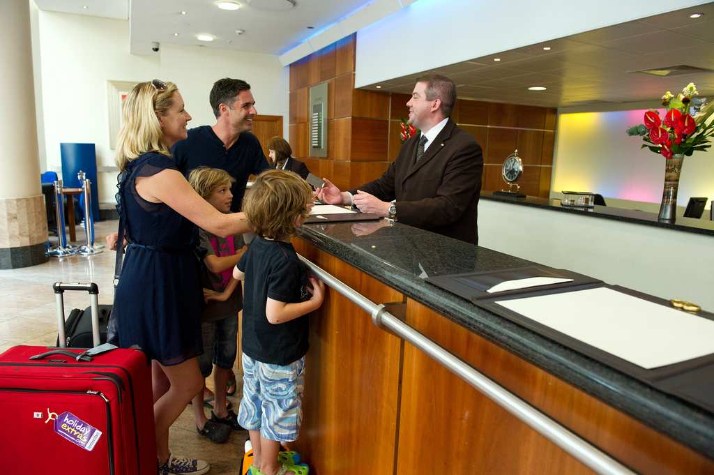 Family at the hotel check in ...