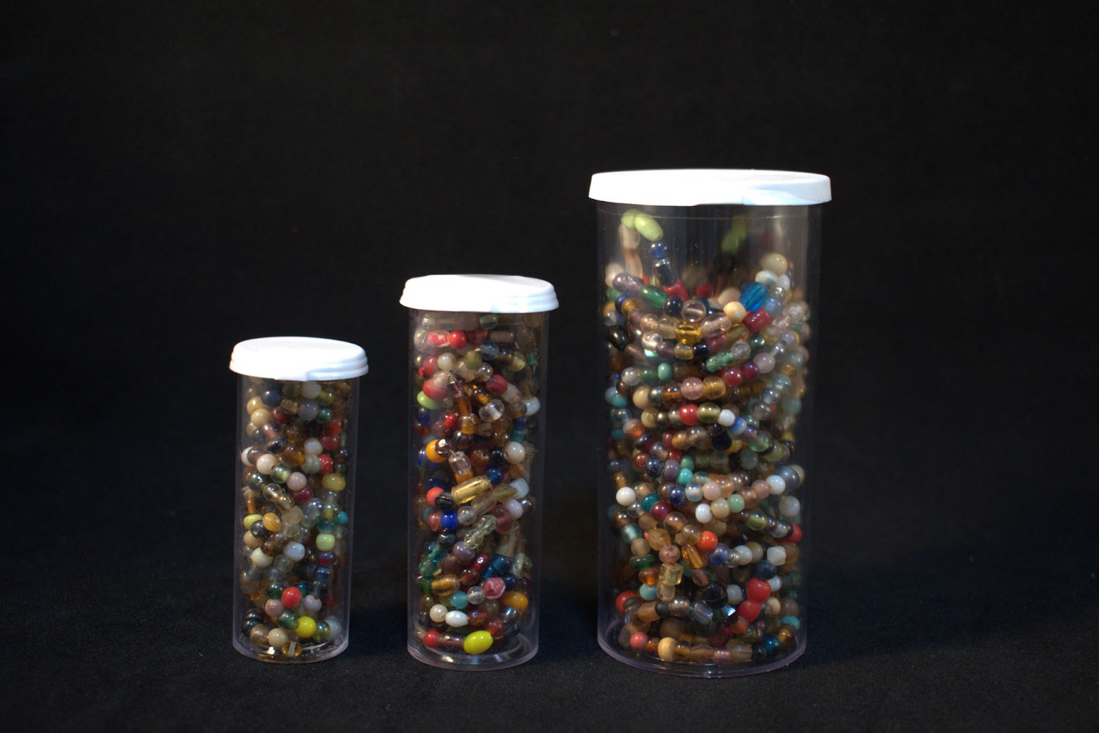 Strings of Beads in Various Sized Vials