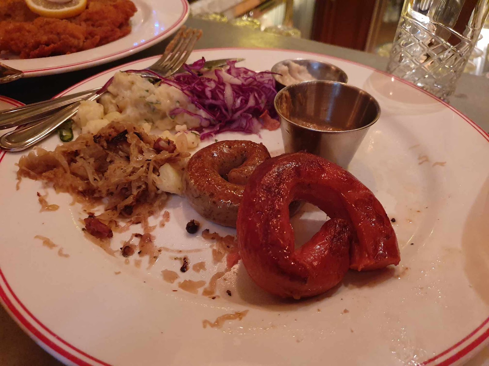 Schnitzel & Schnaps sausages with sauerkraut and potatoes