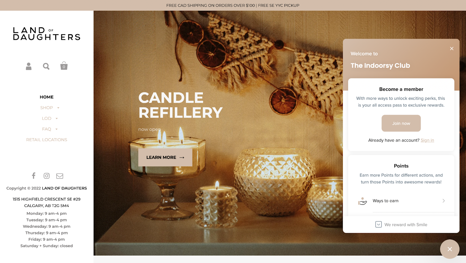 screenshot of homepage of ecommerce candle company Land of Daughters