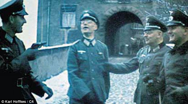 Fooling around: A still from newly-discovered film showing first moving pictures from inside the infamous Colditz Prison