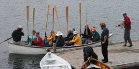 rowers in the boat, oars up