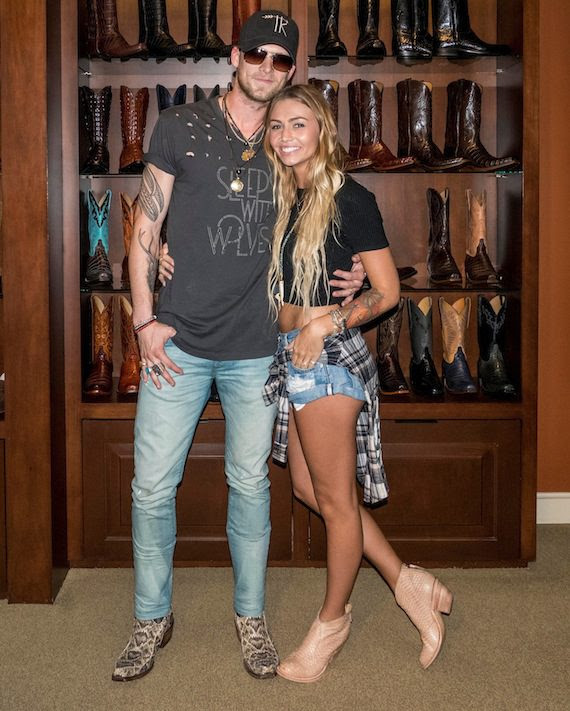 Florida Georgia Line’s Brian Kelley and wife, Brittney Kelley, presented their "bohemian chic" Tribe Kelley collection of clothes and accessories Thursday at a pop-up shop inside the Lucchese Bootmaker store in Nashville’s trendy Gulch neighborhood.    Tyler Hubbard, the other half of the Florida Georgia Line super-duo, showed his support by attending the lively event with fiancé Hayley Stommel.   Brian wore never-before-seen pieces he designed from the upcoming Tribe Kelley men’s collection, out later this month, and handmade Lucchese eastern diamond rattle snake boots. Brittney wore her Tribe Kelley designs with handmade Lucchese sable python booties. Photo:  Ed Rode