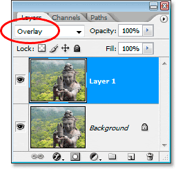 Changing the blend mode of the duplicate layer to 'Overlay'.