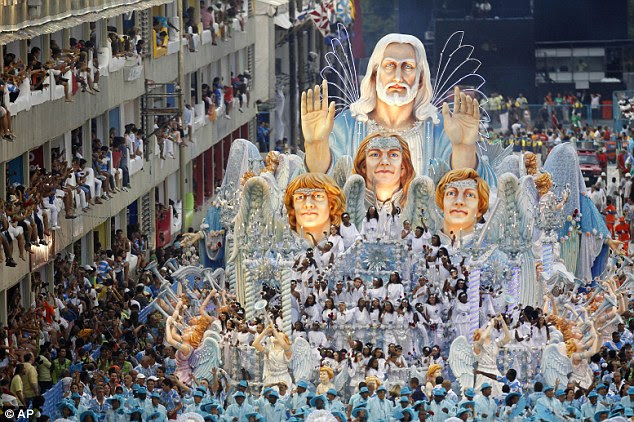 Divine inspiration: The Beija Flor samba school float includes a giant statue of Jesus Christ