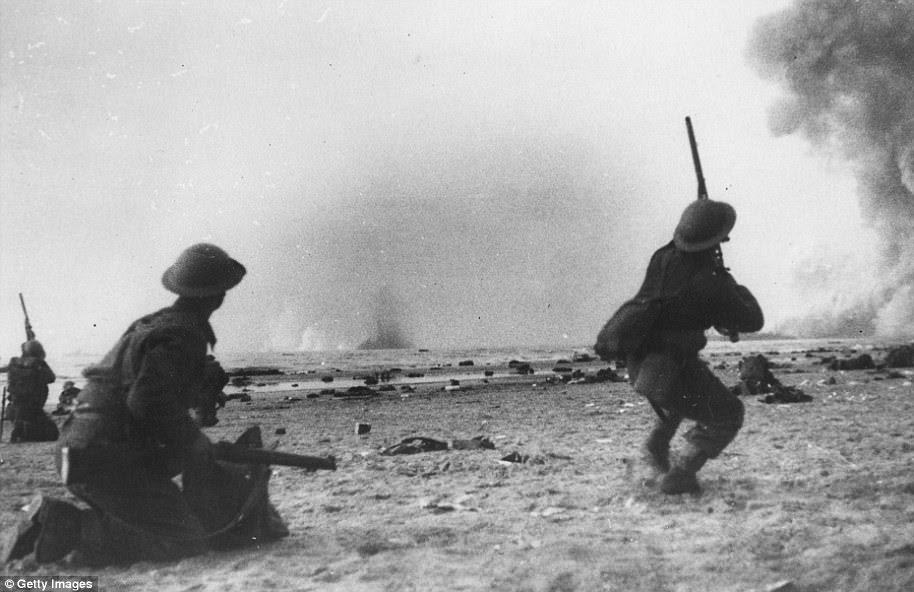 British soldiers fight a rearguard action during the evacuation at Dunkirk, shooting rifles at attacking aircraft in 1940