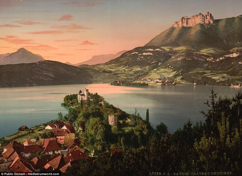Stunning: This picture shows the sun setting over the Chateau de Duingt in the alpine town of Annecy in southeastern France