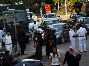 Riot police stand guard in anticipation of a petition drive by Mohamed ElBaradei's political party Riot police stand guard in anticipation of a petition drive by Mohamed ElBaradei's political party