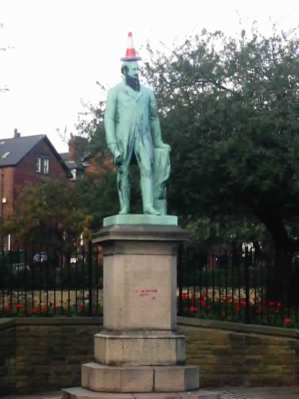 The traffic cone lends a certain dignity to a City Father