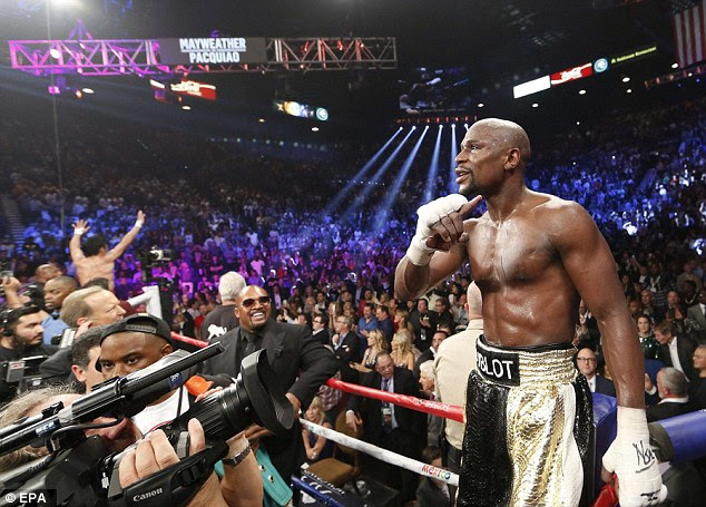 Mayweather celebrates his win over Pacquiao which extend his winning record to 48 without loss