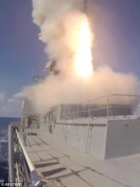 Russian spies have already showed their capabilities brazenly in the U.S. presidential election. Pictured, cruise missiles launched from the Admiral Grigorovich