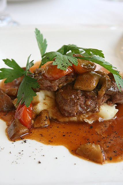 Pan-fried veal medallions with porcini mushrooms and truffle aroma