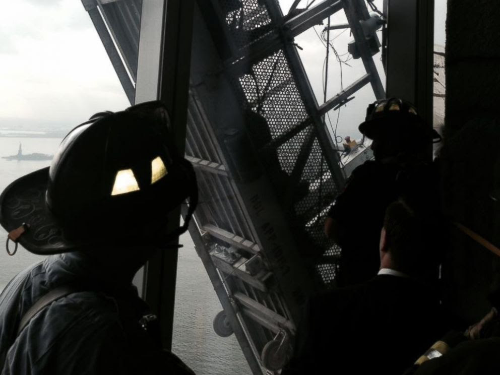 PHOTO: The FDNY posted this photo to Twitter on Nov. 12, 2014 with the caption. Now: #FDNY rescuing workers trapped on scaffolding outside 1 World Trade Center. View from the 68th floor.