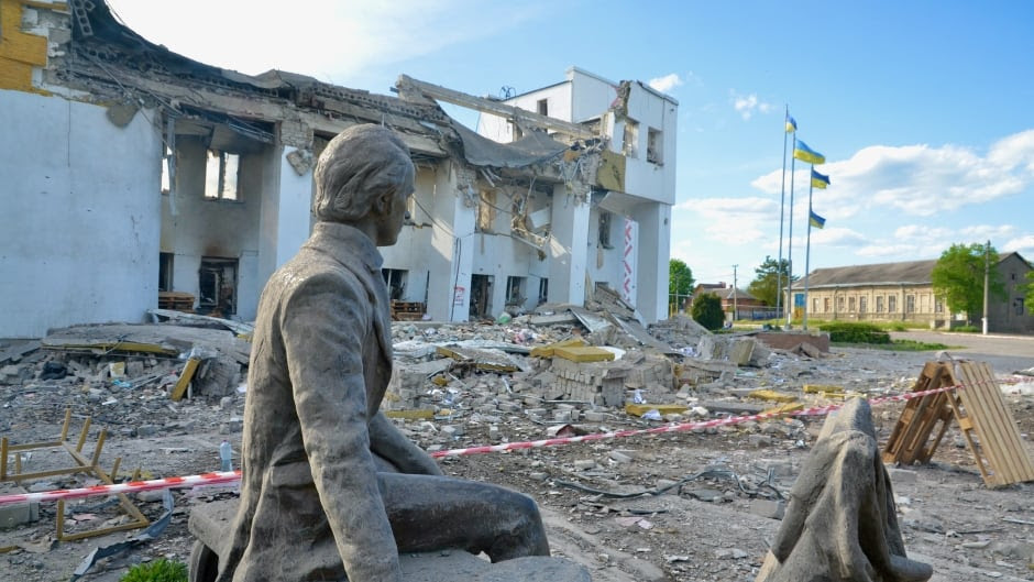 Anger, sadness follow bombing of cultural centre in Ukrainian town of Derhachi