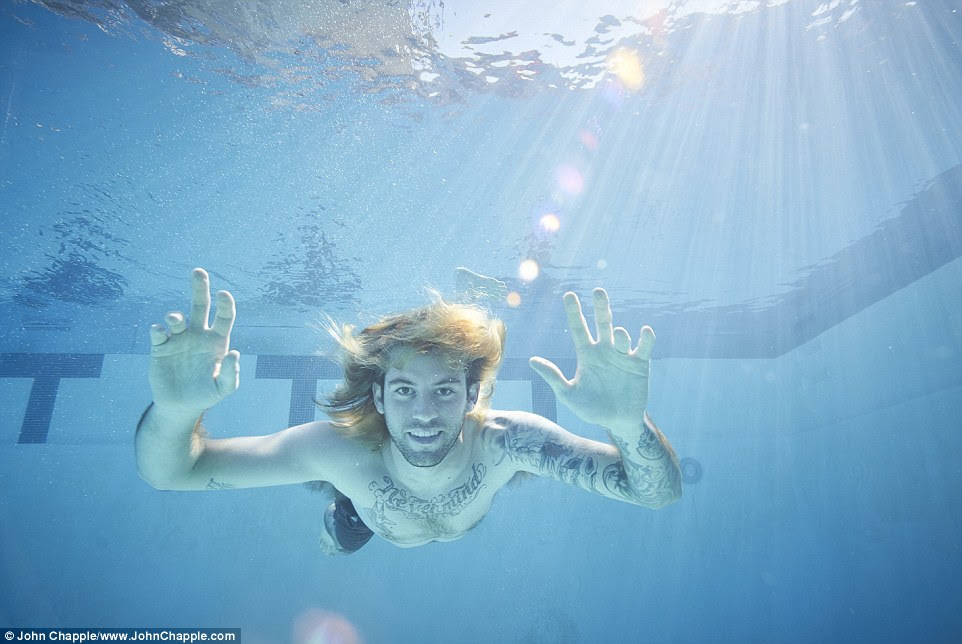 Nirvana's Nevermind album baby recreates iconic photo 25 years later | Daily Mail Online
