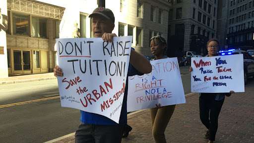 UMass Boston faculty, staff and students led a protest outside a meeting of the University of Massachusetts trustees' Administration and Finance Committee Wednesday morning. [Photo: Katie Lannan/SHNS]