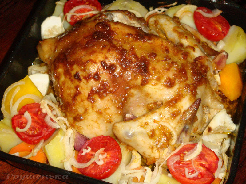 Запеченная курица с овощами рецепт. Курица в духовке. Курица запеченная с овощами в духовке. Вкусная Курочка с овощами в духовке. Курица в духовке целиком с овощами.