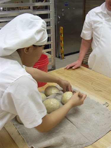 egg washing the pumpernickel rounds