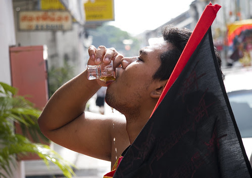 Ma Song takes a drink
