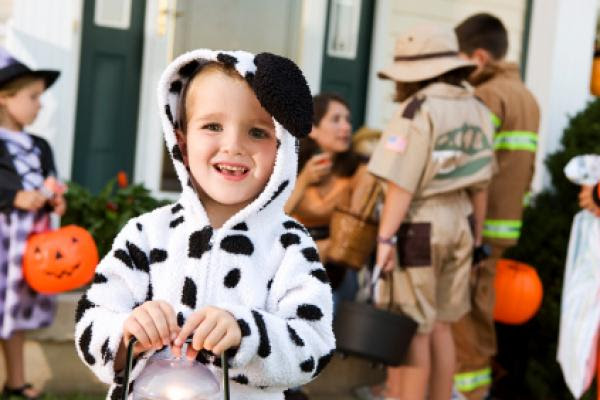 Group of children in a Trick or Treating during Halloween Group of children in a Trick or Treating during Halloween