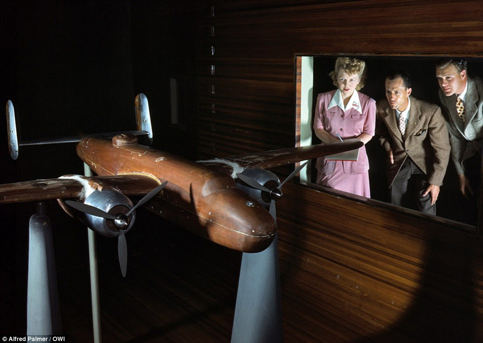 Staff at the North American Aviation plant observing wind tunnel tests on a model of the B-25 bomber