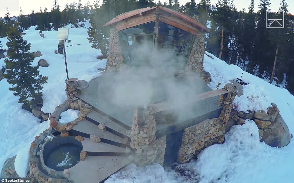 Former pro-snowboarder Mike Basich has built a tiny, isolated cottage in the Sierra Nevada mountains near Truskee, California, complete with its very own hot tub (bottom left)