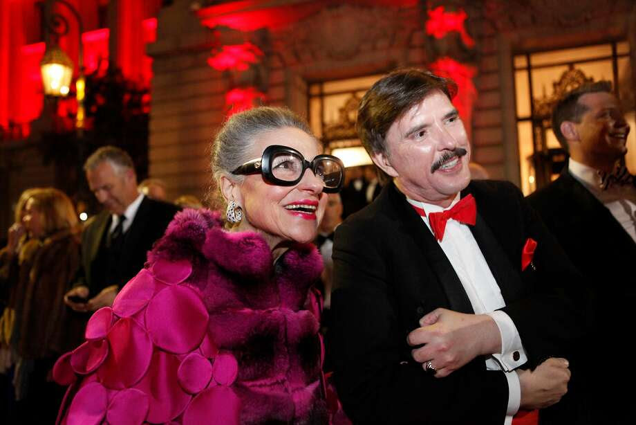 Joy Bianchi and John Rosin wait to cross the street to attend the performance of the San Francisco Ballet season-opening gala in 2013. Photo: Alex Washburn, Special To The Chronicle
