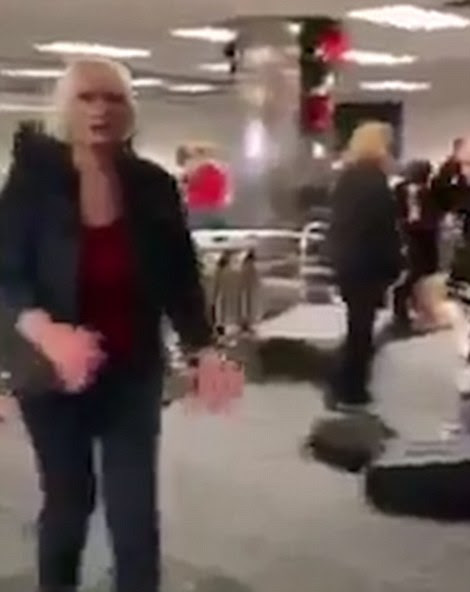 One woman walked towards the camera and said there had been bullets 'flying everywhere' during the shooting