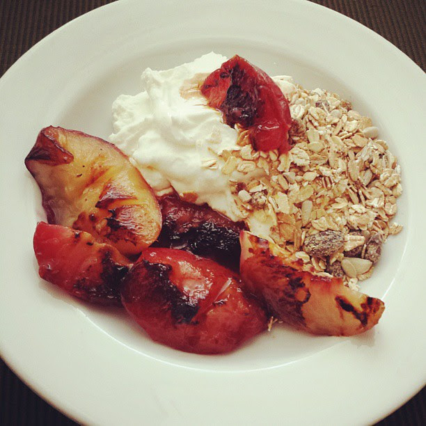 Cool Greek yogurt, muesli, and warm grilled peaches & plums. This is all the laboring I'm doing today.