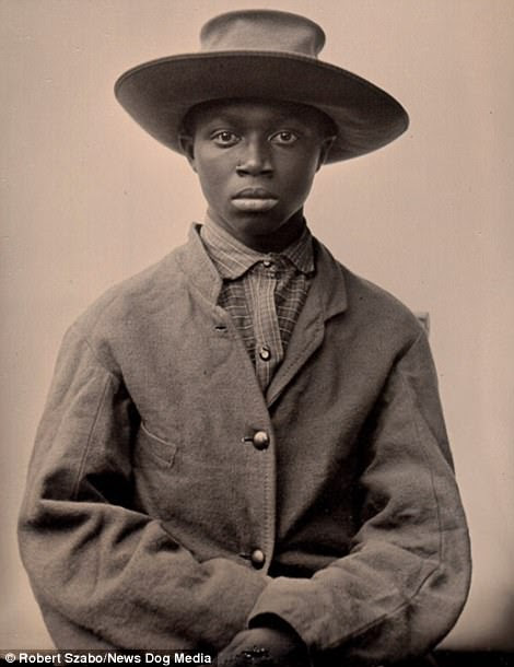 A boy in period Civil War clothing
