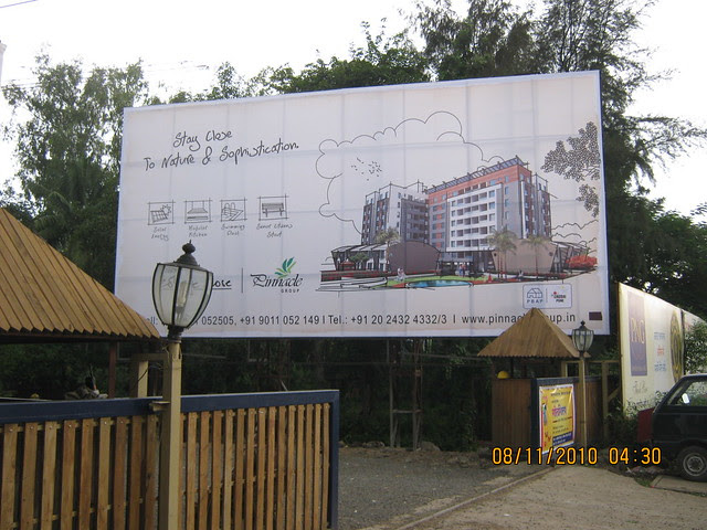 Pinnacle Cottage Close - hoarding at the main gate of 'Abhiruchi Village' on Sinhagad Road Pune 411 041