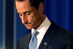 Anthony Weiner leaves a press conference after admiting to sending a lewd Twitter photo