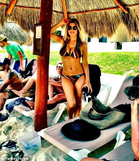 'Adiós Cancún!' Fergie shows off her impressive bikini body during a holiday in Mexico