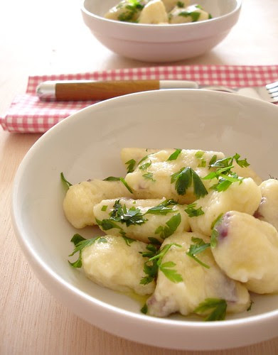 Olive gnocchi with parsley garlic sauce