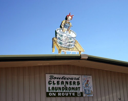 the wash lady neon sign atop boulevard cleaners & laundromat on route 66