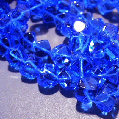 27802346-08 Glass - 8 mm Dancing Cube - Sapphire (strand 25)
