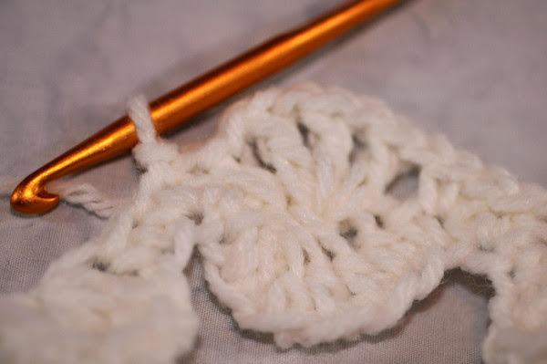 Katherine Wheel hole stitched over
