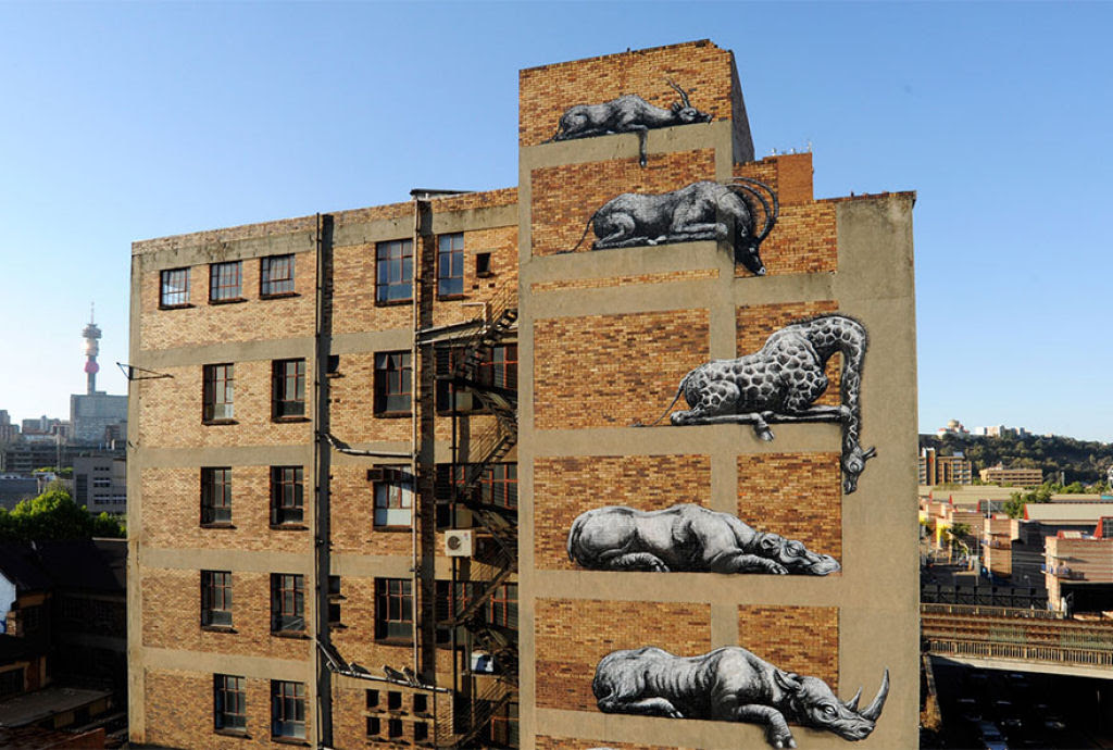 24 eloquentes obras de arte urbana mostrando a desagradável verdade 10